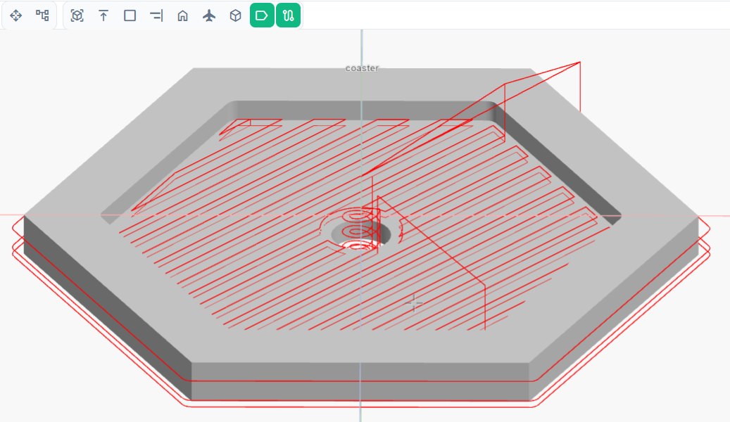 Coaster with the generated CAM toolpath overlaid in red. The Tool paths toggle in the toolbar is active.